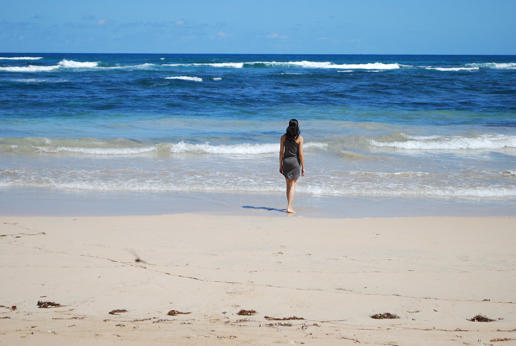 Yoga practice by the beach at Isla Indah Retreat.